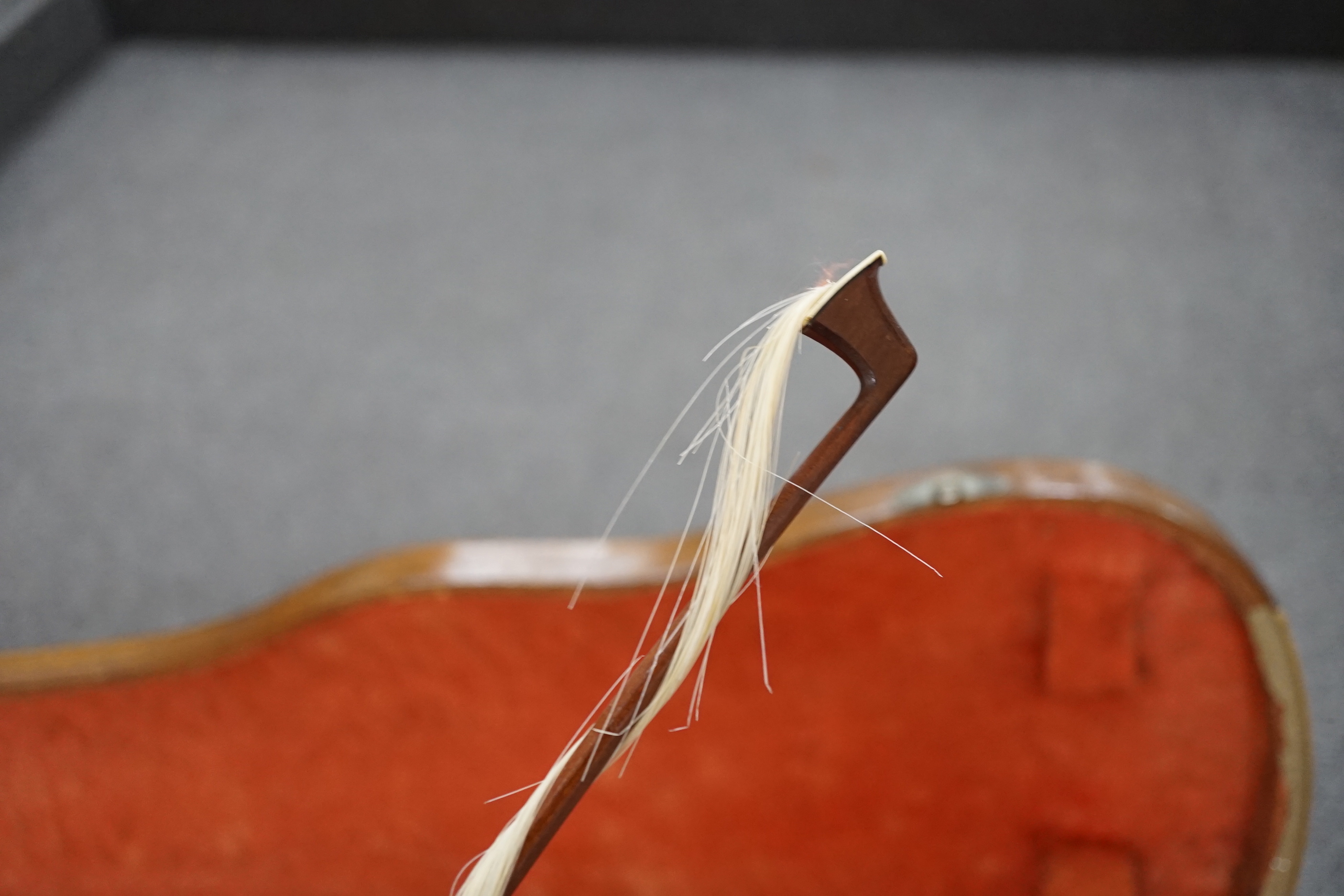 A 19th century violin with silver mounted bow and case, back measures 36cm CITES Submission reference JX7RJU7S